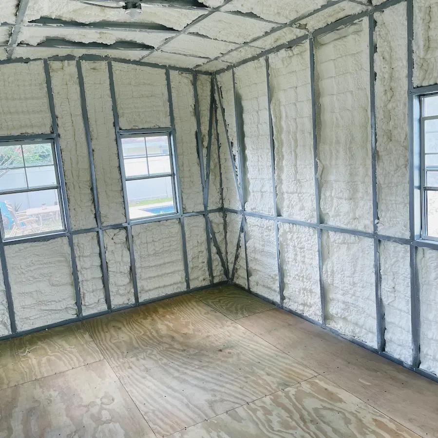 Closed-cell spray foam insulation applied to wall cavities in a residential project in Irvine